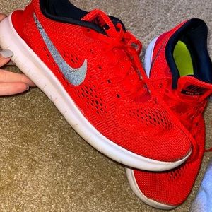Nike free red running shoes